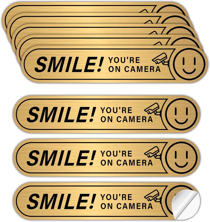 LUHIMO 8PCS Smile You're On Camera Sticker for Car, Self Adhesive Brushed Gold Durable Video Surveillance Sign Sticker, Security Camera Sign for Home, Business, Vehicles and Window（5" x 1"） - Image 1